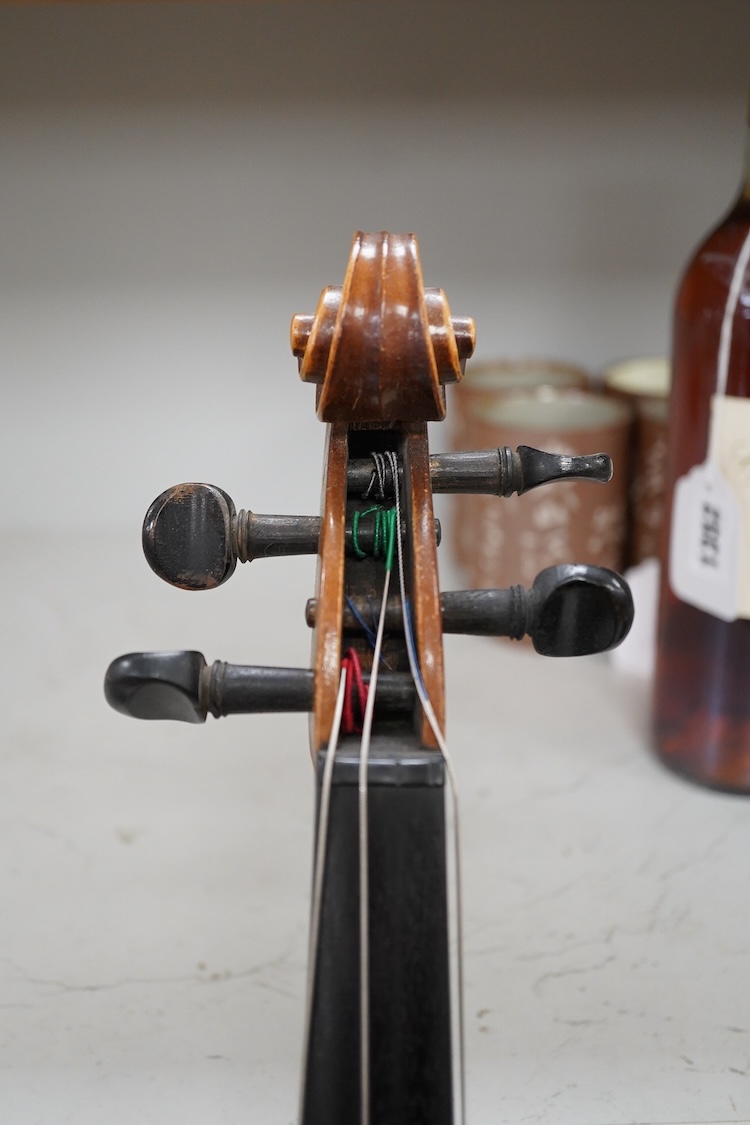 A mid 20th century cased Czech viola 15.25” body, with a fully mounted octagonal bow with plastic tip plate